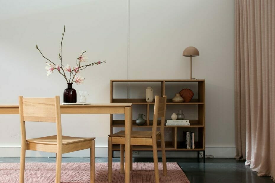 brown wooden dining table with chairs